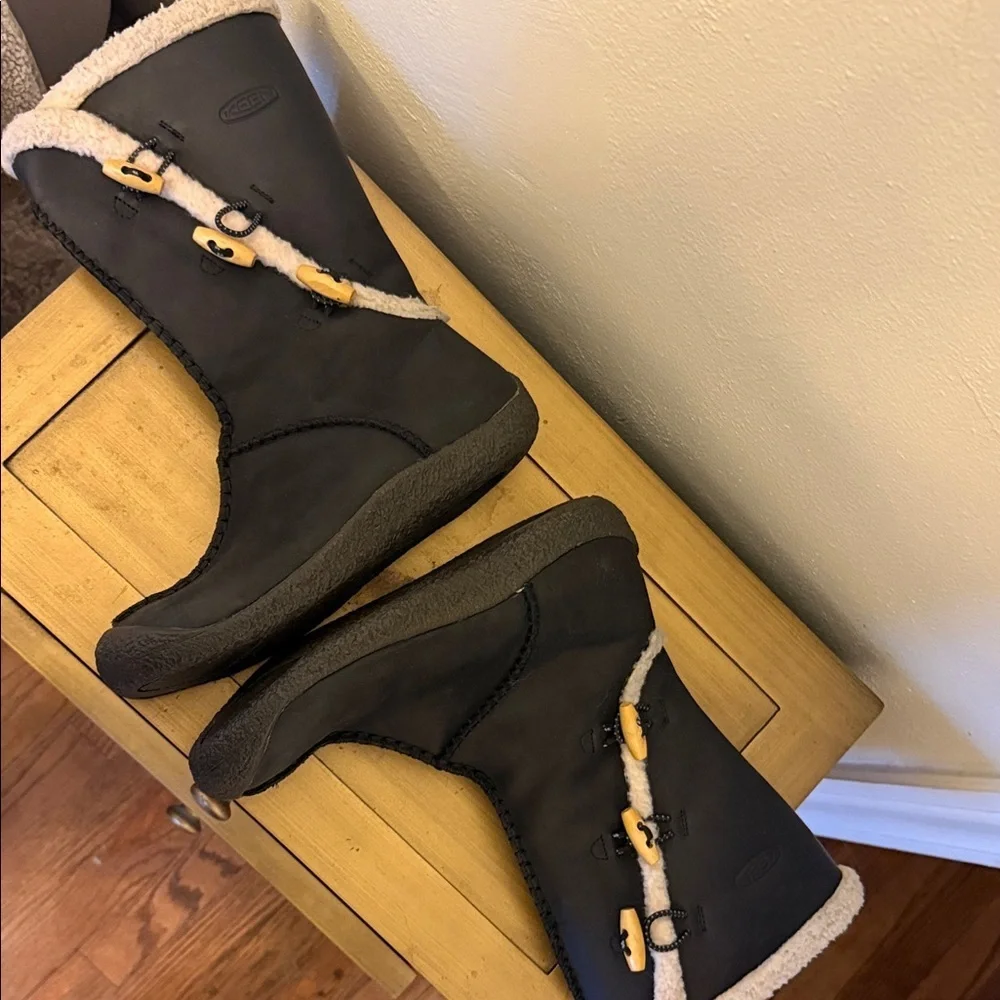 Black Shearling-Trim Winter Boots with Toggle Accents